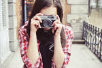 a girl with camera by onecherry