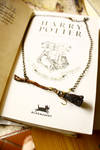Miniature Firebolt necklace by sixAstray