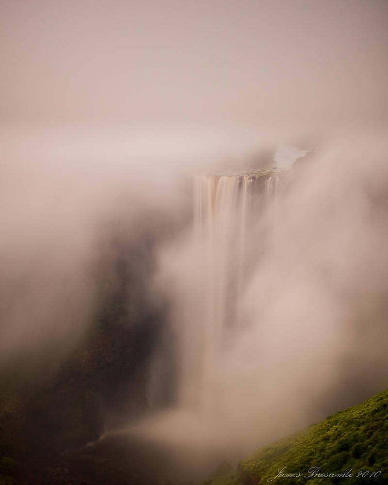 Water falls through mist by jmbroscombe