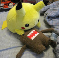 Pikachu eats Domo by secretsheik