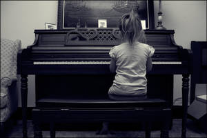 Playing the Piano by LovelyBPhotography