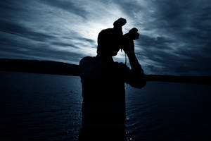 photographer in the blue by Lundaren