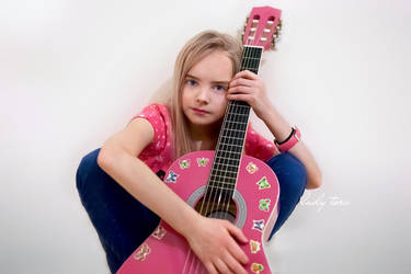 A girl and her guitar by Lady-Tori