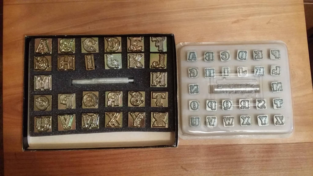 Two of the alphabet leather stamping sets by Refiner