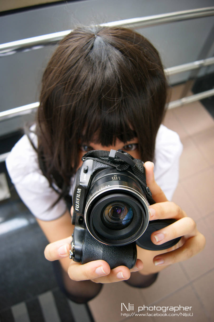 The girl with Camera by Niijou