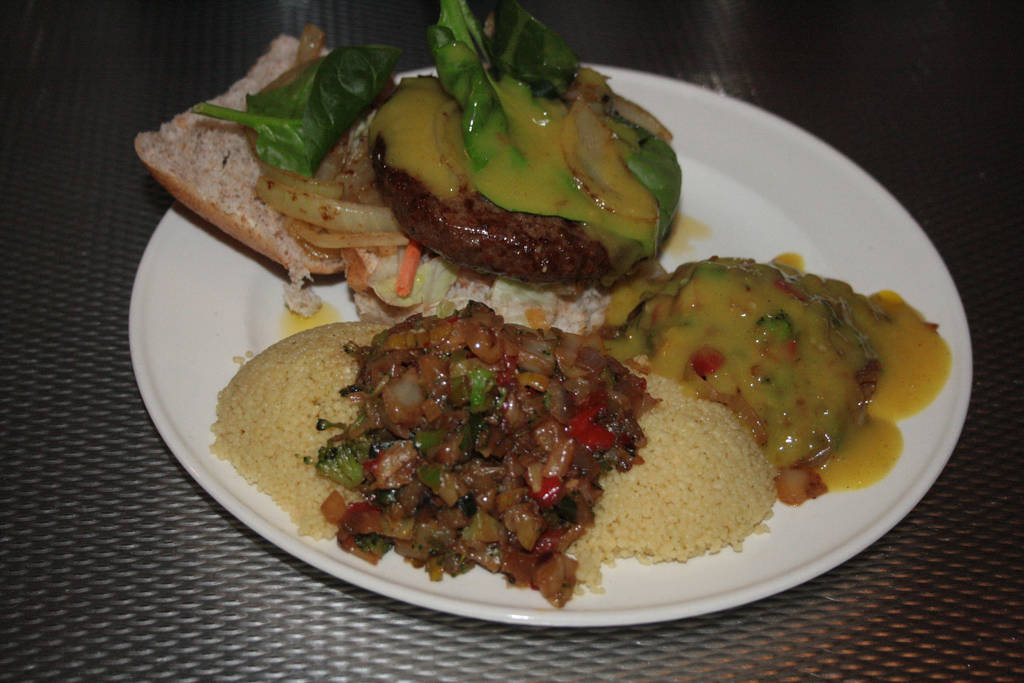 Hamburger and couscous with curry-sauce wok by FiXato