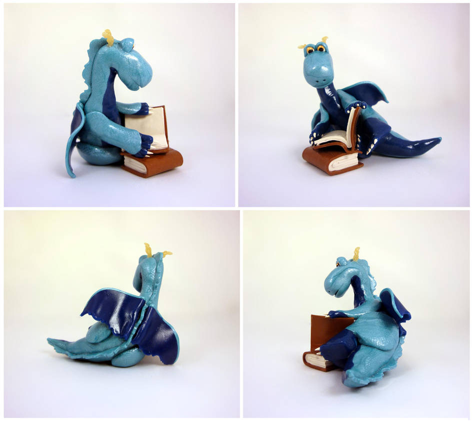 Blue dragon with a book by Koreena