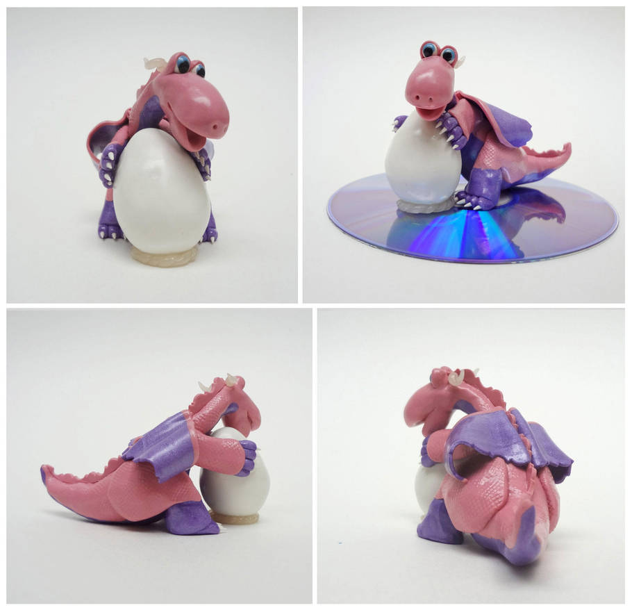 Pink and purple dragon with egg by Koreena