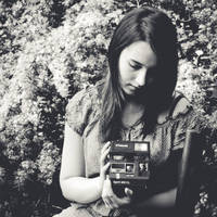 With my polaroid camera by DorottyaS