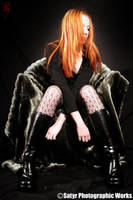 Mel in chair by Ravage-Satyr