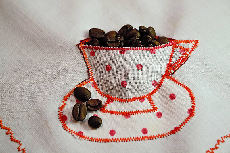 Cup with coffee beans by gabiano Cup with coffee beans by gabiano
