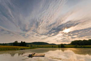 Sunrise and a raft by Sulde