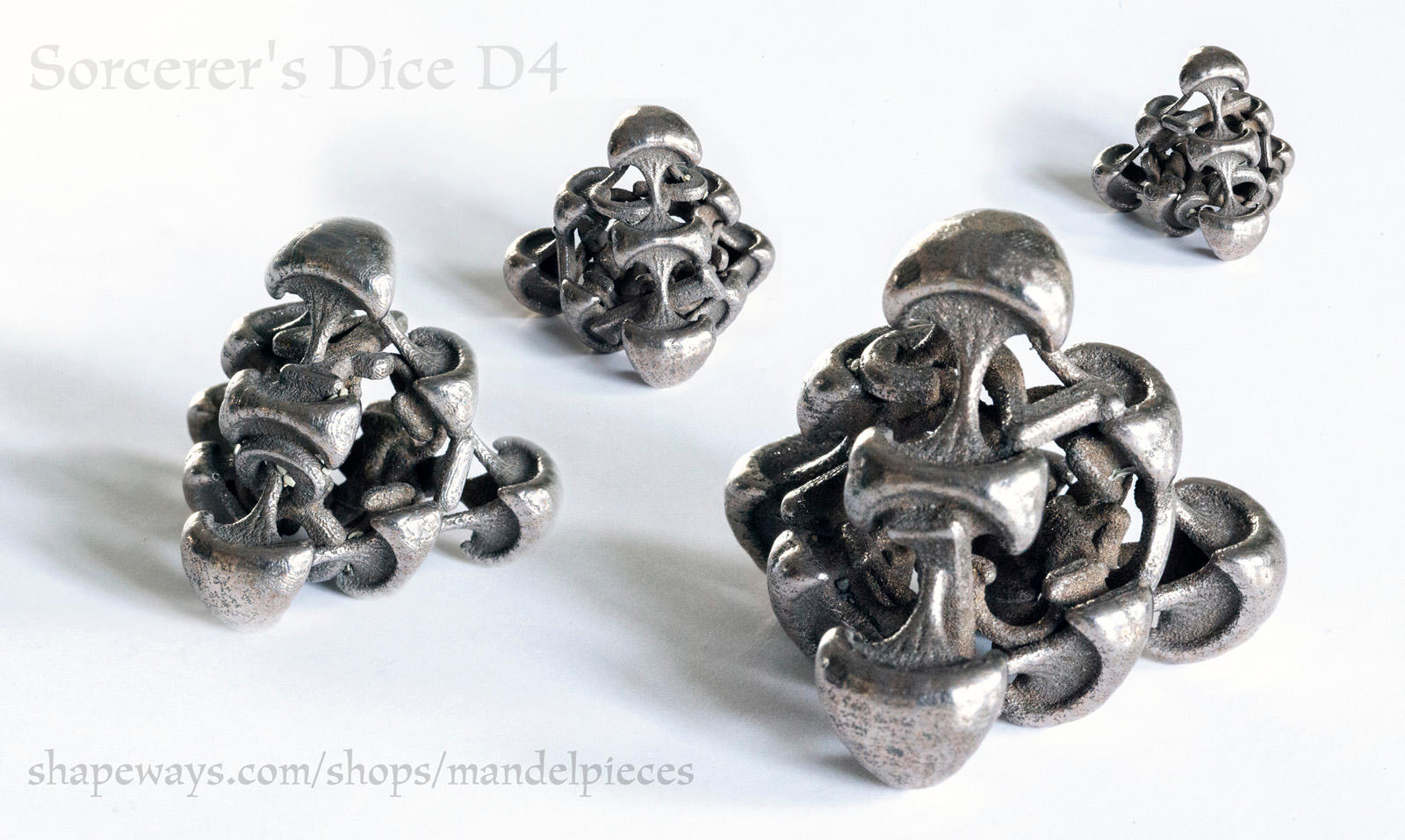 Sorcerer's Dice D4 - 3D printed in Steel by MANDELWERK