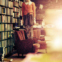Standing in a bookshop by Holunder
