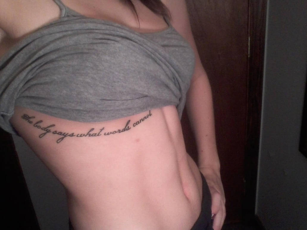 rib tattoos under breast
